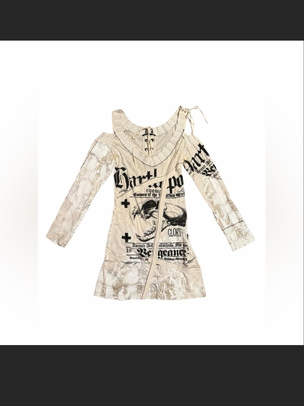 SALVAGE and The Devils Graphic Lace-Sleeve and Back Dress in Cream and Black.